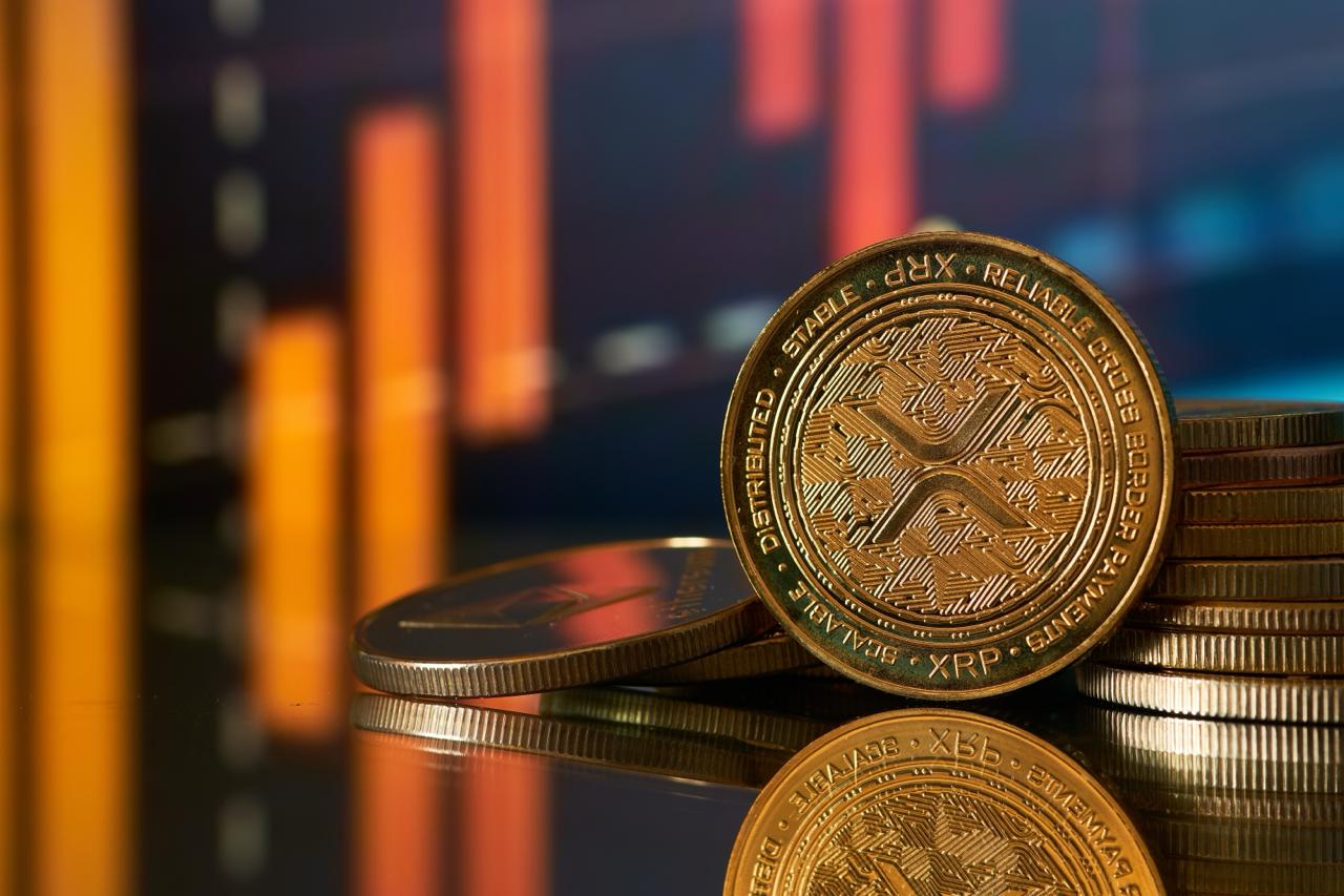 XRP Whale Outflows Hit 2024 Highs as Retail Share Falls to Multi-Year Lows